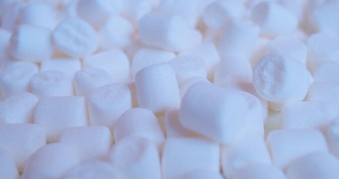 Sweet food background.Small marshmallows close up.