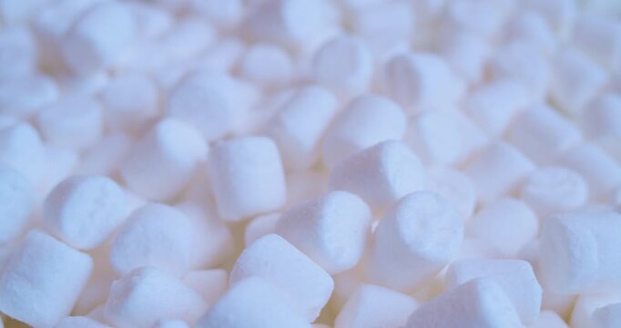 White marshmallow, close-up. Sweet food. Macro with shallow depth of field.