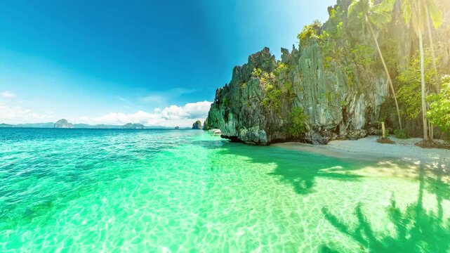 360 view of Entalula Beach lagoon with crystal turquoise water framed by towering limestone cliffs and swaying palms, idyllic Palawan escape for island hopping and relaxation in El Nido, Philippines