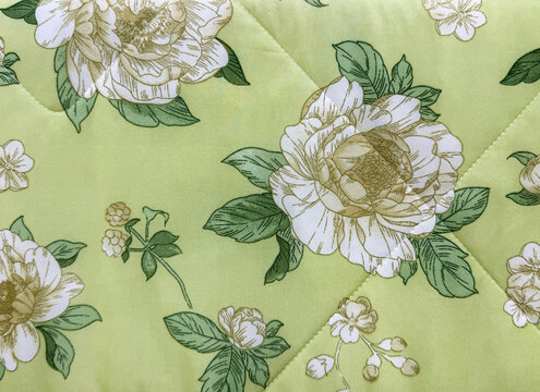 Graphic background of white rose flower with green color background. Printed wallpaper and fabric concept. Seamless background texture.