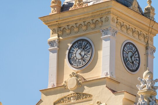 Close up of the clock tower of Malaga City Hall, a neobaroque building from 1919 located on Paseo del Parque in Malaga Spain