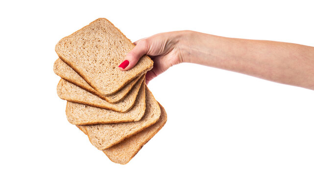 Hand with square slices of whole wheat bread, healthy food. Isolated on white background.