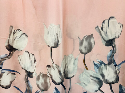Graphic background of random white tulip flower with pink color background. Printed wallpaper and fabric concept. Seamless background texture.