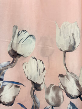 Graphic background of random white tulip flower with pink color background. Printed wallpaper and fabric concept. Seamless background texture.