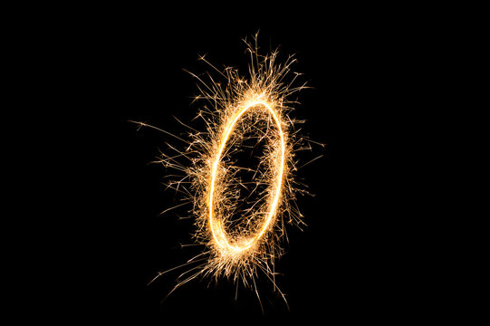 Illuminated Sparkler with Glowing Oval Shape, Holiday Fireworks at Night