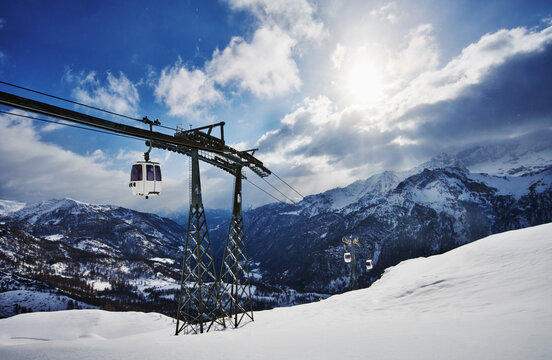 View of the gondola traveling up the Valtournenche valley from the Cervino Ski area, Italian alps, Italy, Europe 