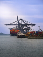 Fototapeta premium Cargo ships and container cranes at Yantian Port, Shenzhen