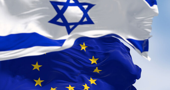 State of Israel national flag waving in the wind with the European Union flag. The European Union and Israel maintain close relations in trade and research. 3d illustration render. Rippling fabric