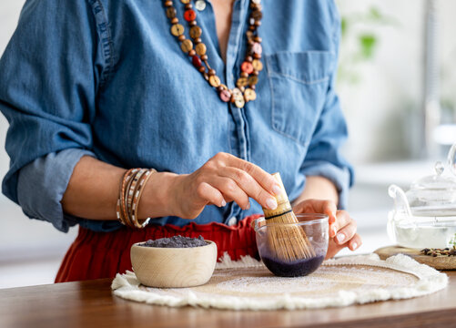 Woman Making Blue Matcha Tea