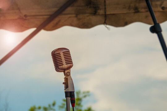 Stage microphone awaits speaker or performer