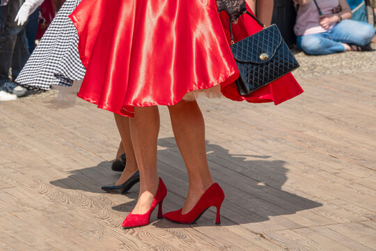 Dancing in the sun with bright dresses