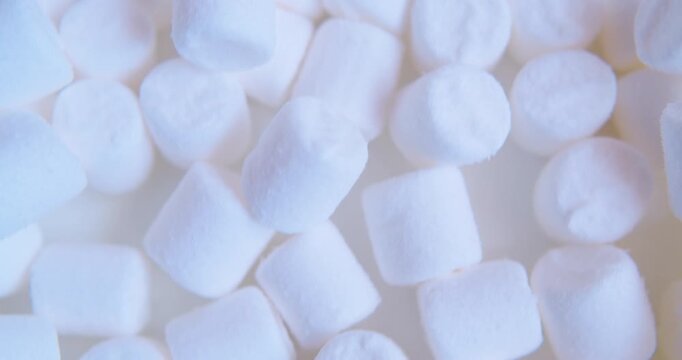 White marshmallow, close-up. Sweet food. Macro with shallow depth of field.