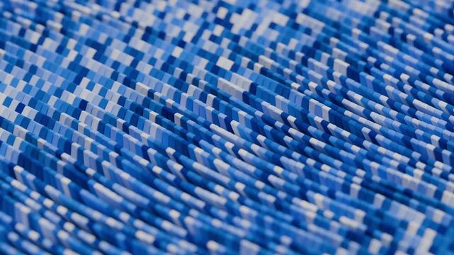 Abstract background with dynamic field of small blue and white cubic elements forming smooth waves. Voxel pattern animation with clean geometric design, smooth gradients and soft blur effect. 4K 60fps