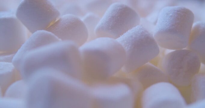 White marshmallow, close-up. Sweet food. Macro with shallow depth of field.