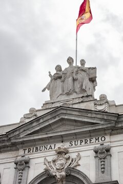 Detail of the statues at the top of the main facade of the Spanish Supreme Court, the highest court where politicians and high officials are tried in Spain.