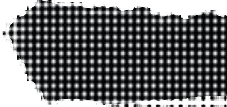 A dark smudge spreads across a plain white surface slowly