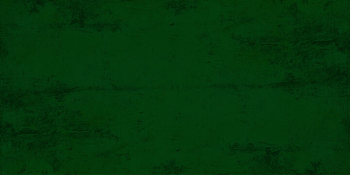 A dark green grunge wall background featuring a rough vintage texture on an aged canvas material with an empty grungy pattern for a dirty textured backdrop