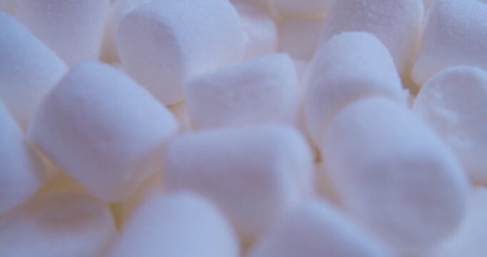 Sweet food background.Small marshmallows close up.