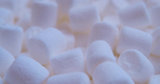 Sweet food background.Small marshmallows close up.