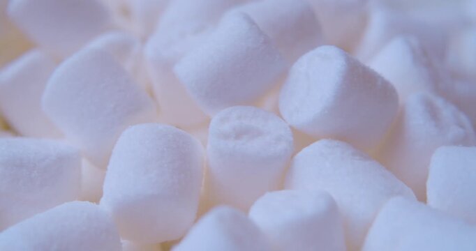 Sweet food background.Small marshmallows close up.