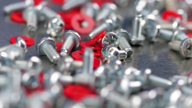 Metal screws for fastening equipment. Soft focus. Close-up. 