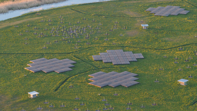 Aerial view of the LOFAR superterp radio telescope array with geometric antenna tiles on a green field at sunset in Buinen, Drenthe, Netherlands.