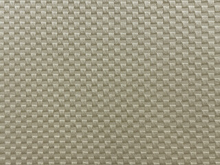 Fototapeta premium Close up of silver grey fabric in checkerboard or checkered pattern, square and rectangular pattern. Seamless silver synthetic fabric background texture.
