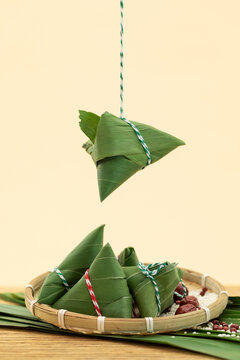 Traditional zongzi rice dumplings wrapped in bamboo leaves for Dragon Boat Festival
