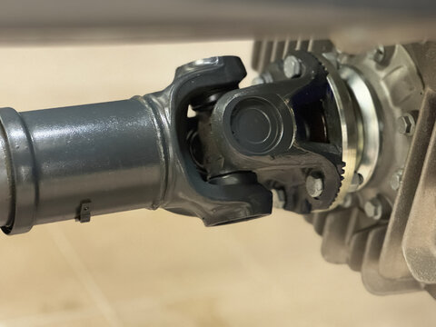 Close-up of universal joint and driveshaft on a truck
