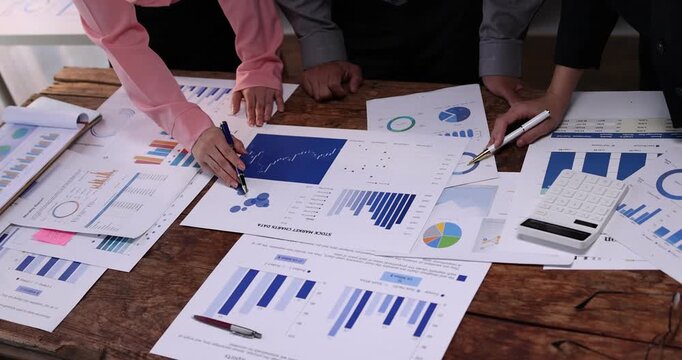 Hands and graphs on tablet screen for finance results, profit growth and budget review. Staff, team and digital with financial report, revenue stats and dividend comparison of risk assessment