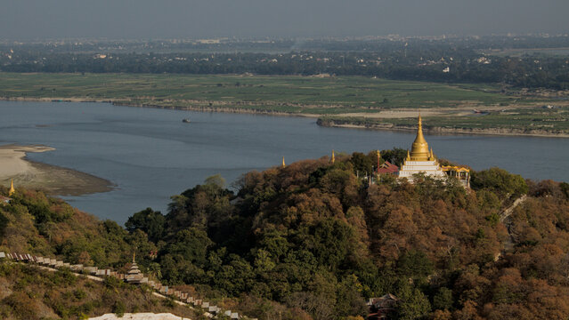 Hilltop Buddhist pagoda above Irrawaddy River in Mandalay, Myanmar