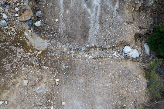 Aerial View of Gravelly Dirt Erosion and Rocky Terrain on a Hillside in British Columbia, Canada