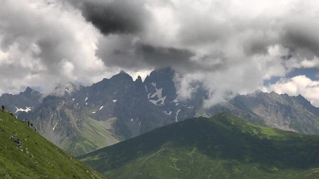 Time lapse clouds race above Mount Kackar peak in Turkey Black Sea mountain landscape. Accelerated sky drift over Altiparmak and Vercenik ridges near Rize, Pontic Alps panorama.