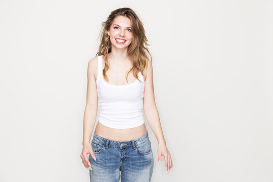 Studio portrait of young woman in studio image.