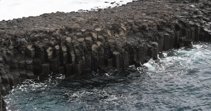 Daepo Jusangjeolli Cliff landscape, Jeju island, volcanic rock formation, Jeju-do, South Korea, Ieodo-ro, Seogwipo, Jeju Province, Columnar jointing view with waves and sea, Korean Natural Monument