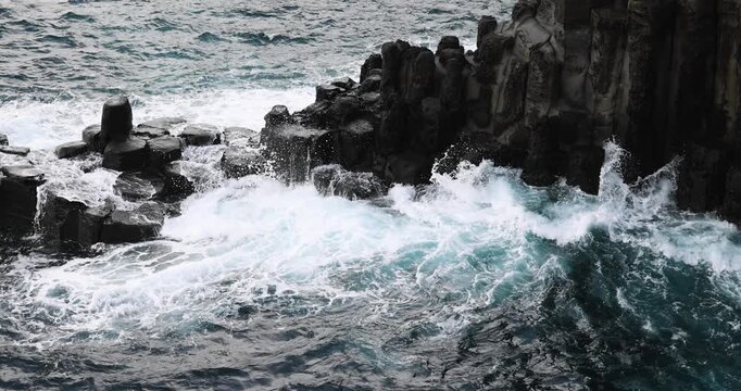 Daepo Jusangjeolli Cliff landscape, Jeju island, volcanic rock formation, Jeju-do, South Korea, Ieodo-ro, Seogwipo, Jeju Province, Columnar jointing view with waves and sea, Korean Natural Monument