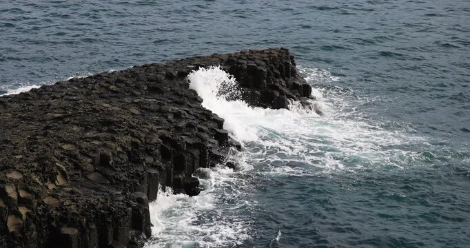 Daepo Jusangjeolli Cliff landscape, Jeju island, volcanic rock formation, Jeju-do, South Korea, Ieodo-ro, Seogwipo, Jeju Province, Columnar jointing view with waves and sea, Korean Natural Monument