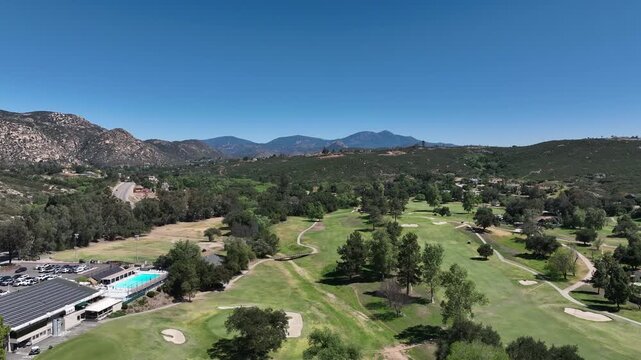 Aerial view of Ramona neighborhood with mountain, valley and San Vicente Golf Course, in California, USA