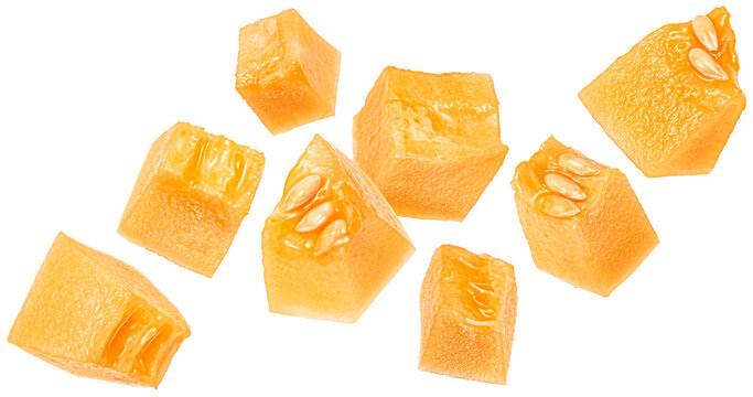Sweet melon pulp cubes isolated on white background with clipping path