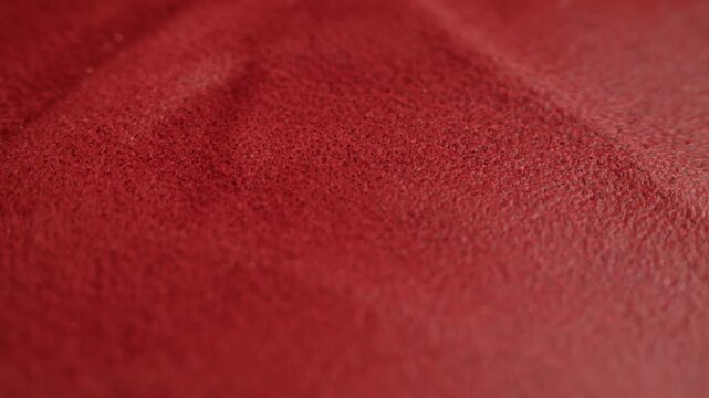 Genuine red leather texture, natural animal skin, luxury vintage cowhide background. Eco friendly leatherette, faux leather. Wallpapere, backdrop, copy space