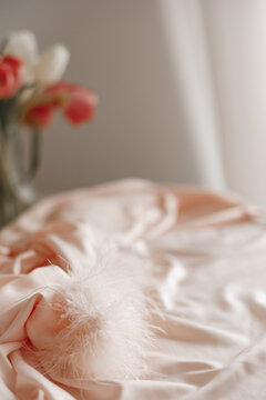Pink Silk Fabric White Feather and Tulip Bouquet Bokeh