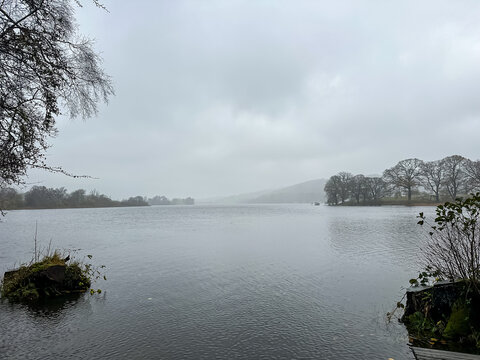 Grasmere and Windermere lakes view. Autumn in Cumbria. Foggy rainy November day. Lake District, Cumbria, England, UK