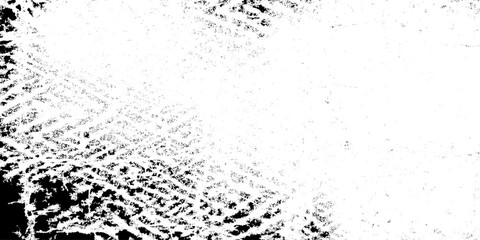 Obraz premium Distressed black and white grunge texture with grainy stipple effect and high contrast ink spatter details for vintage poster design, gritty overlay, and abstract artistic backgrounds.