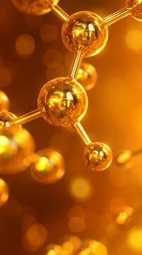 Gold molecular structure floating amid bokeh shimmering nodes and hexagonal rings rotate slowly in warm golden light with floating particles and glitter