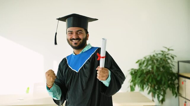 Happy Indian student graduate celebrating university graduation