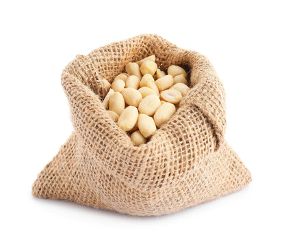Peanuts in burlap bag isolated on white