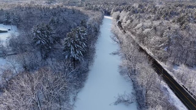 Winter aerial view featuring the Lamprey River upstream of Wadleigh Falls in Lee, New Hampshire