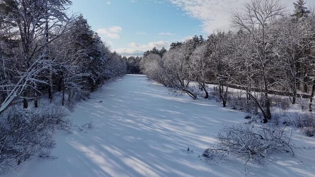 Winter aerial view featuring the Lamprey River upstream of Wadleigh Falls in Lee, New Hampshire