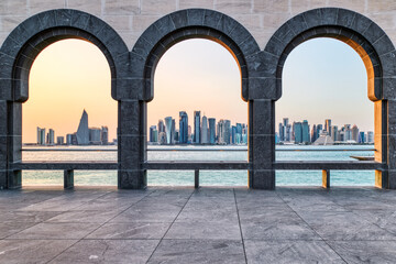 Fototapeta premium Doha Skyline View through Elegant Marble Arches