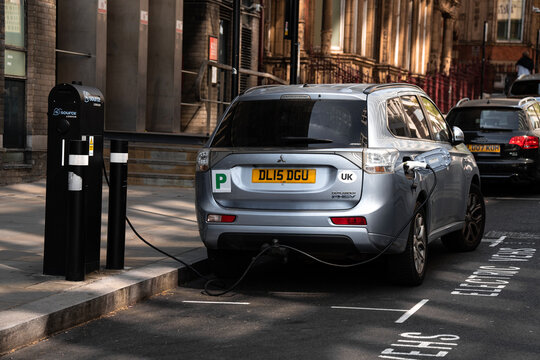 Mitsubishi Outlander PHEV Plug-In Hybrid SUV Electric Vehicle Plugged Into Source London Charger, EV Charging Station, London, United Kingdom - May 2026